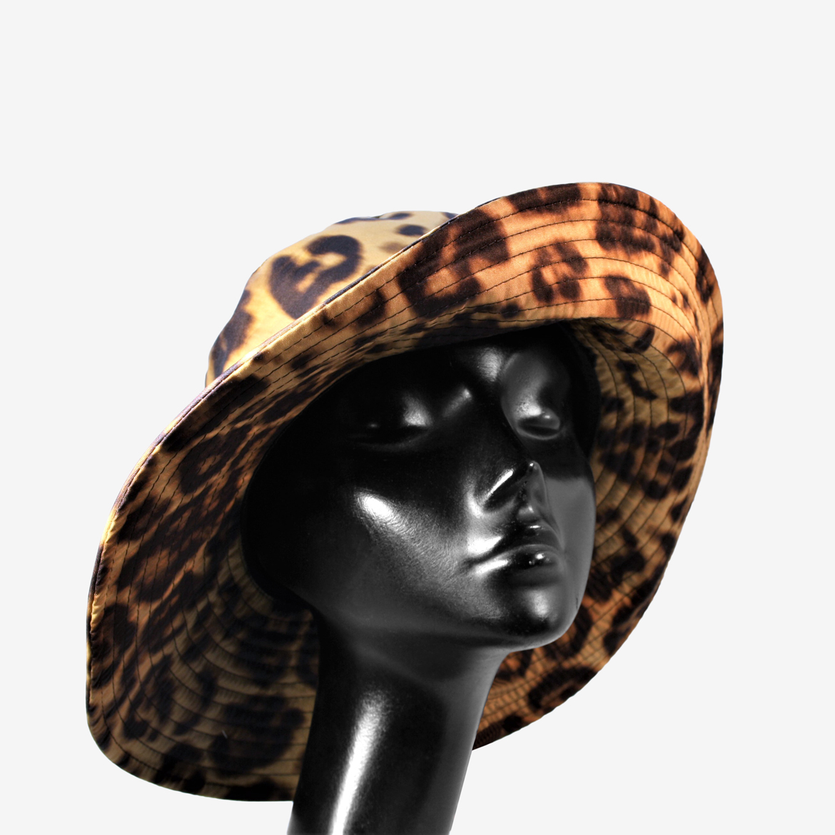 Cappello impermeabile fantasia animalier, regolabile, produzione Banfi -  Cappelleria Viarani
