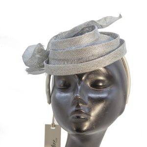 Fascinator in crrine con volute, argento
